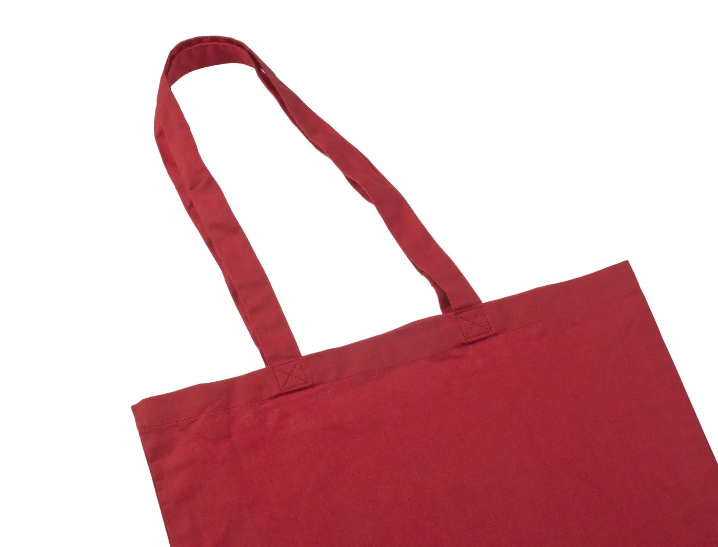 Close-up of the handles on the red 140 g/m² cotton tote bag, showing the fabric straps, stitching and attachment to the bag.