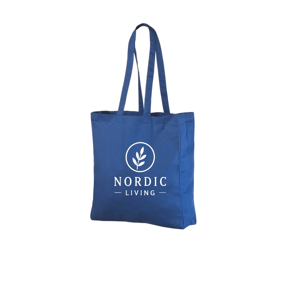 Example of one-colour logo printing on the royal blue 220 g/m² cotton tote bag, showing the sample design on the bag.