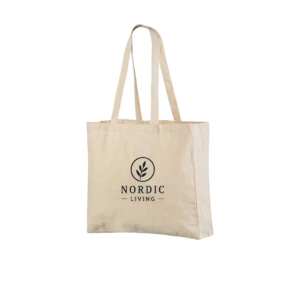Example of one-colour logo printing on the natural 220 g/m² cotton tote bag, showing the sample design on the bag.