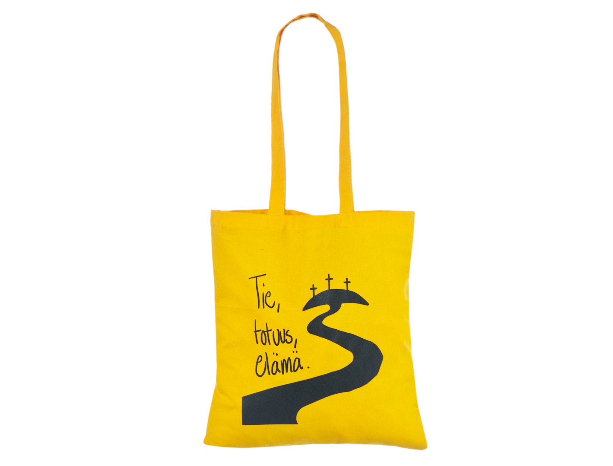 Borsa shopper in cotone gialla con manici lunghi, una strada tortuosa scura che conduce a tre croci e accanto le parole Tie, totuus, elämä.