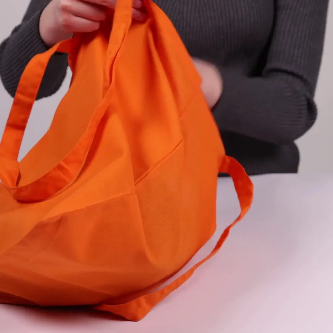 Medvilninis maišelis, 140 g/m², ilgos rankenos, oranžinis - Produkto vaizdo įrašo peržiūra