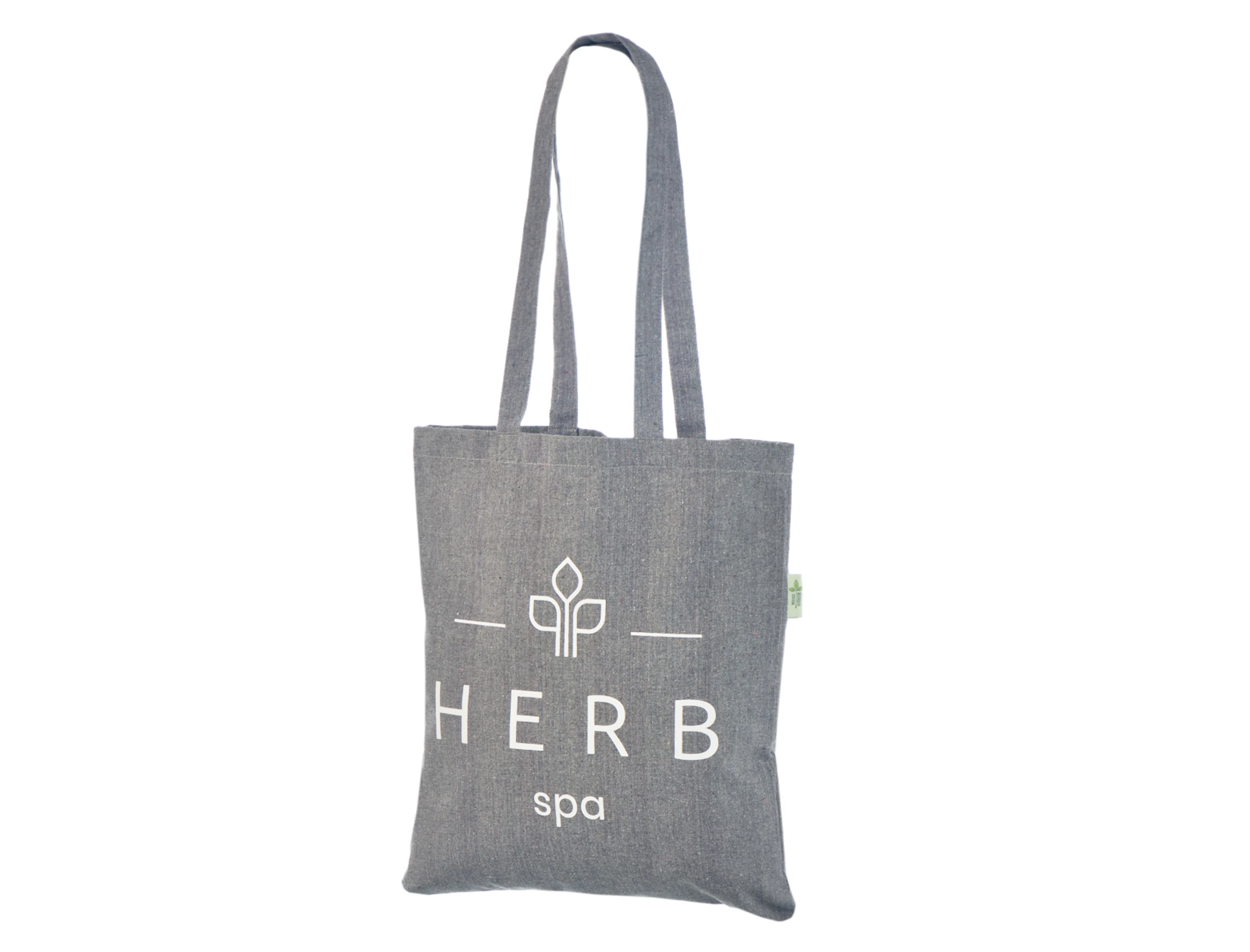 Mottled grey long-handled tote with a white Herb spa logo and leaf motif.
